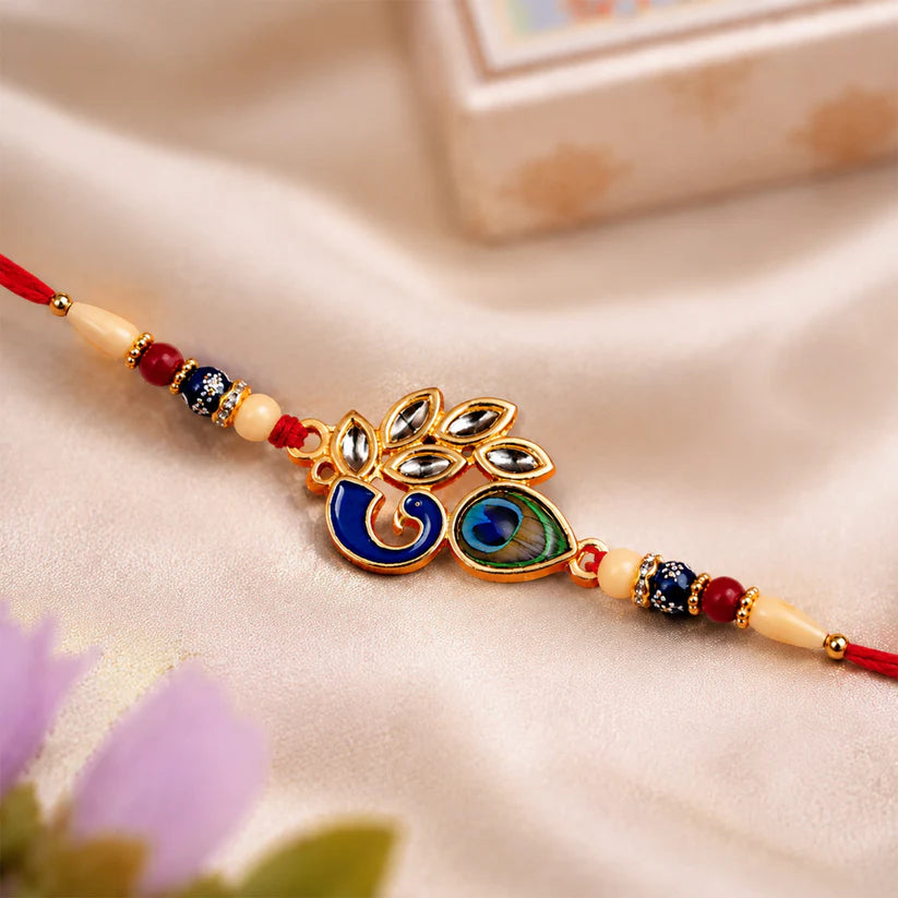 Mor Pankh Rakhi with colourful enamel work and soft threads, ready for festive gifting.