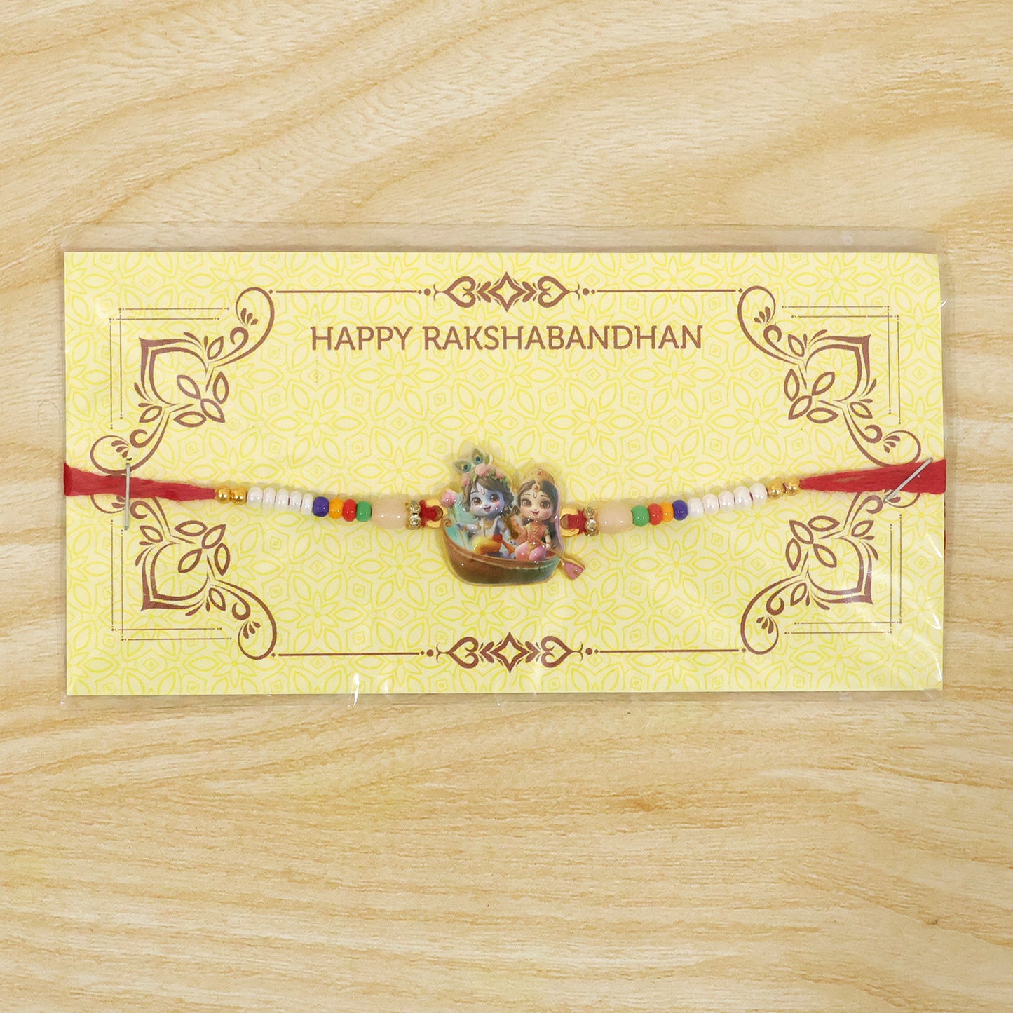Packaging for the Krishna Radha Rakhi, ensuring safe delivery for gifting.