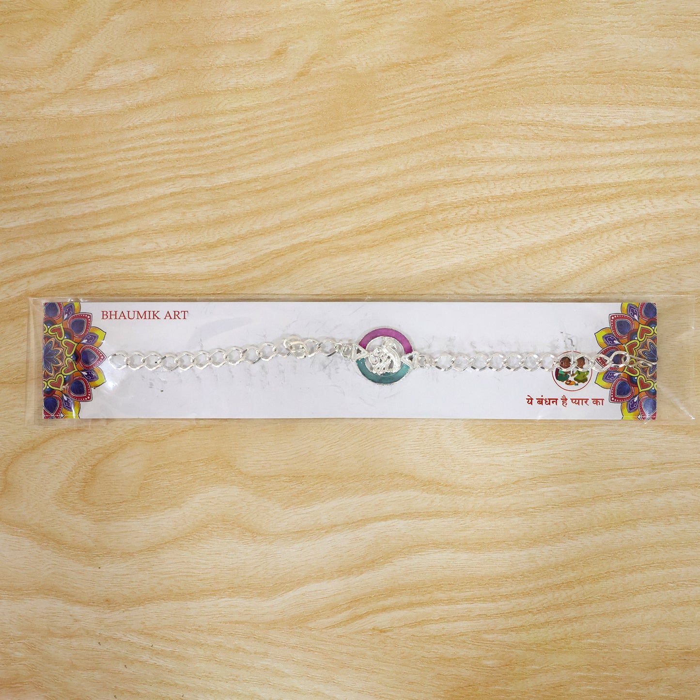 Designer Rakhi Round Om Peacock Motif Crystal Chain