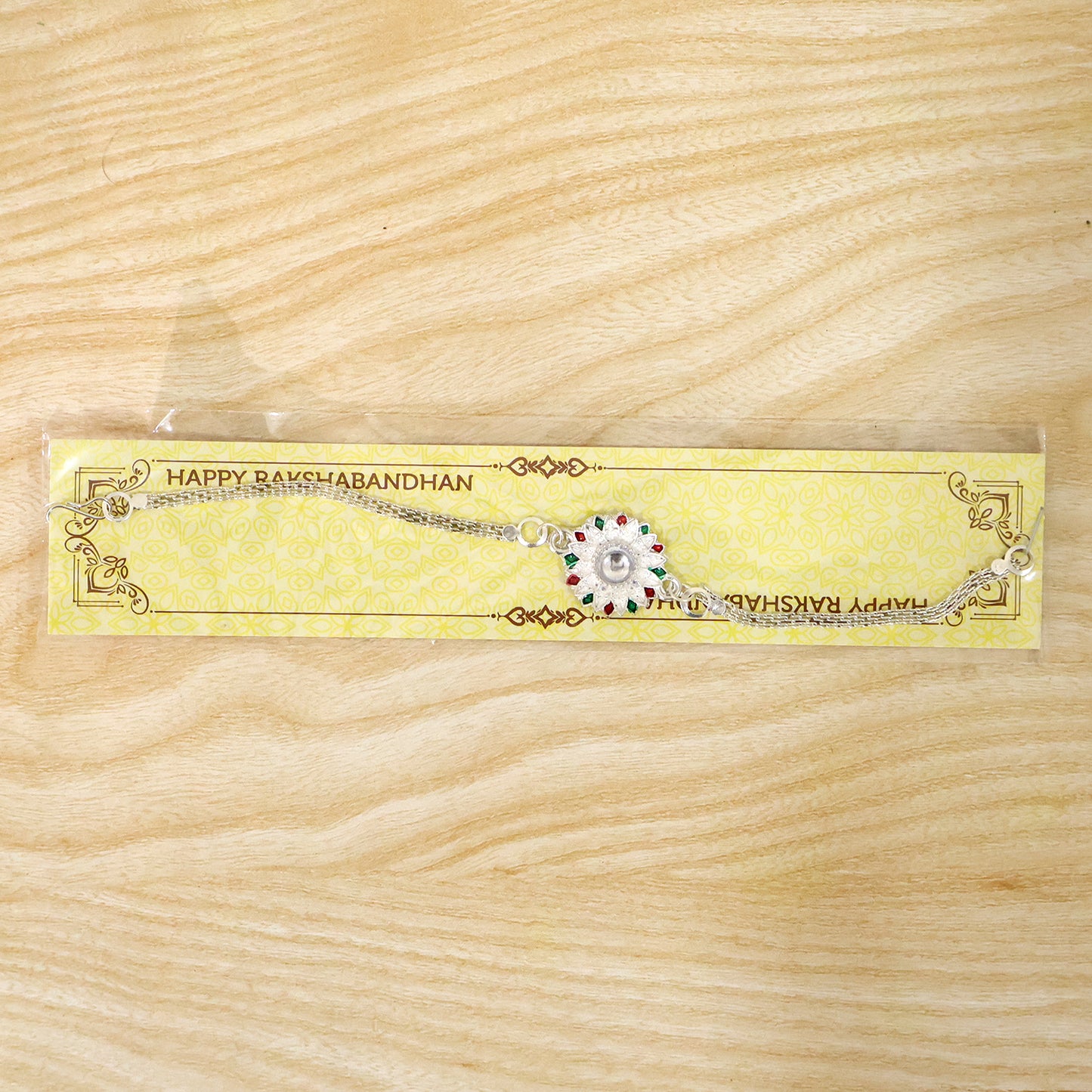 Designer Floral Silver Rakhi with Stone Centerpiece for Brother
