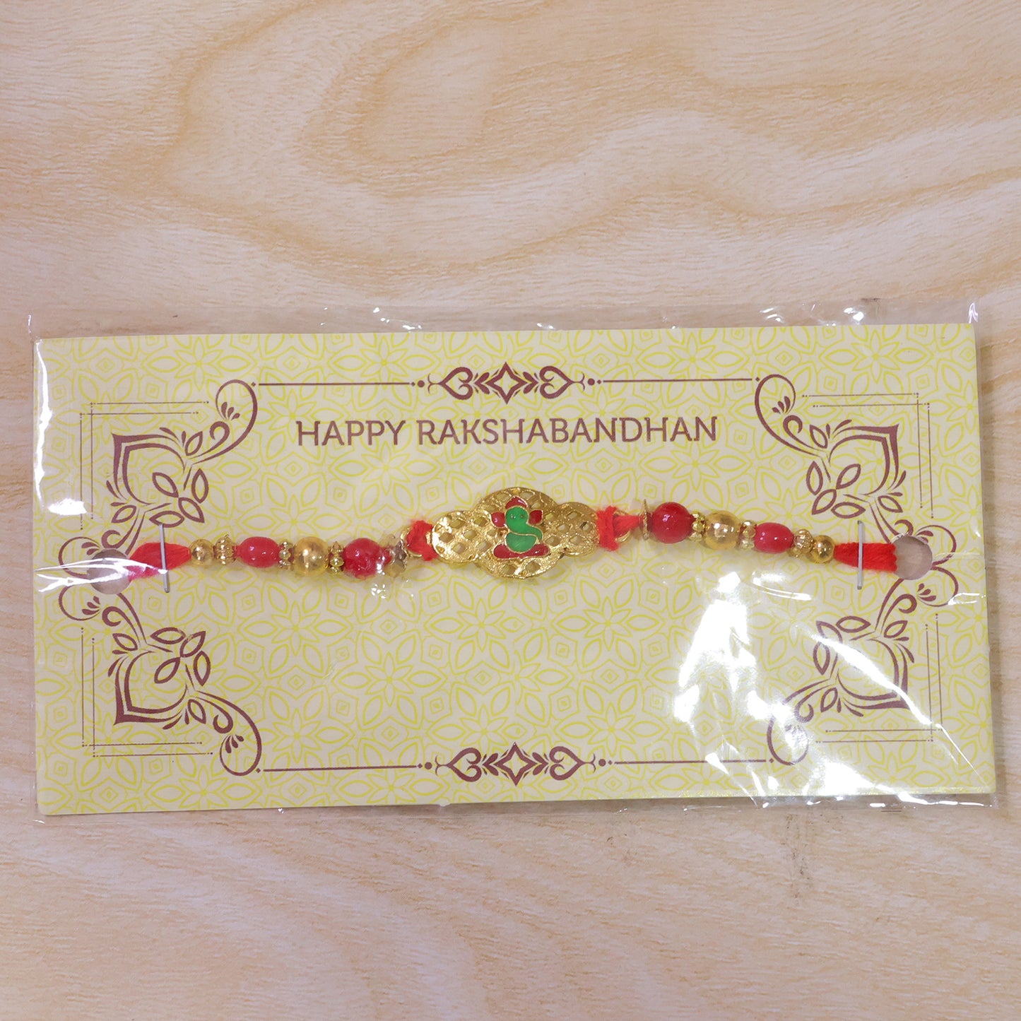 Ganesha Rakhi – Elegant Gold Finish for Raksha Bandhan