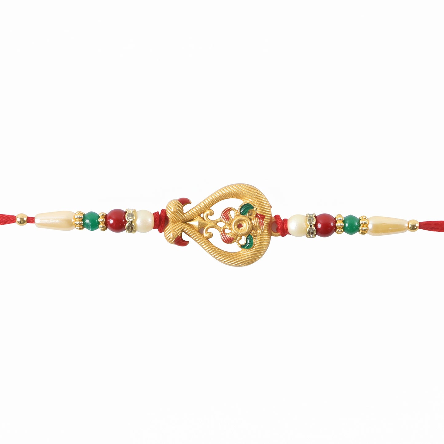 A red thread bracelet with a gold-colored, ornate central charm, accented with red, green, and white beads, against a plain