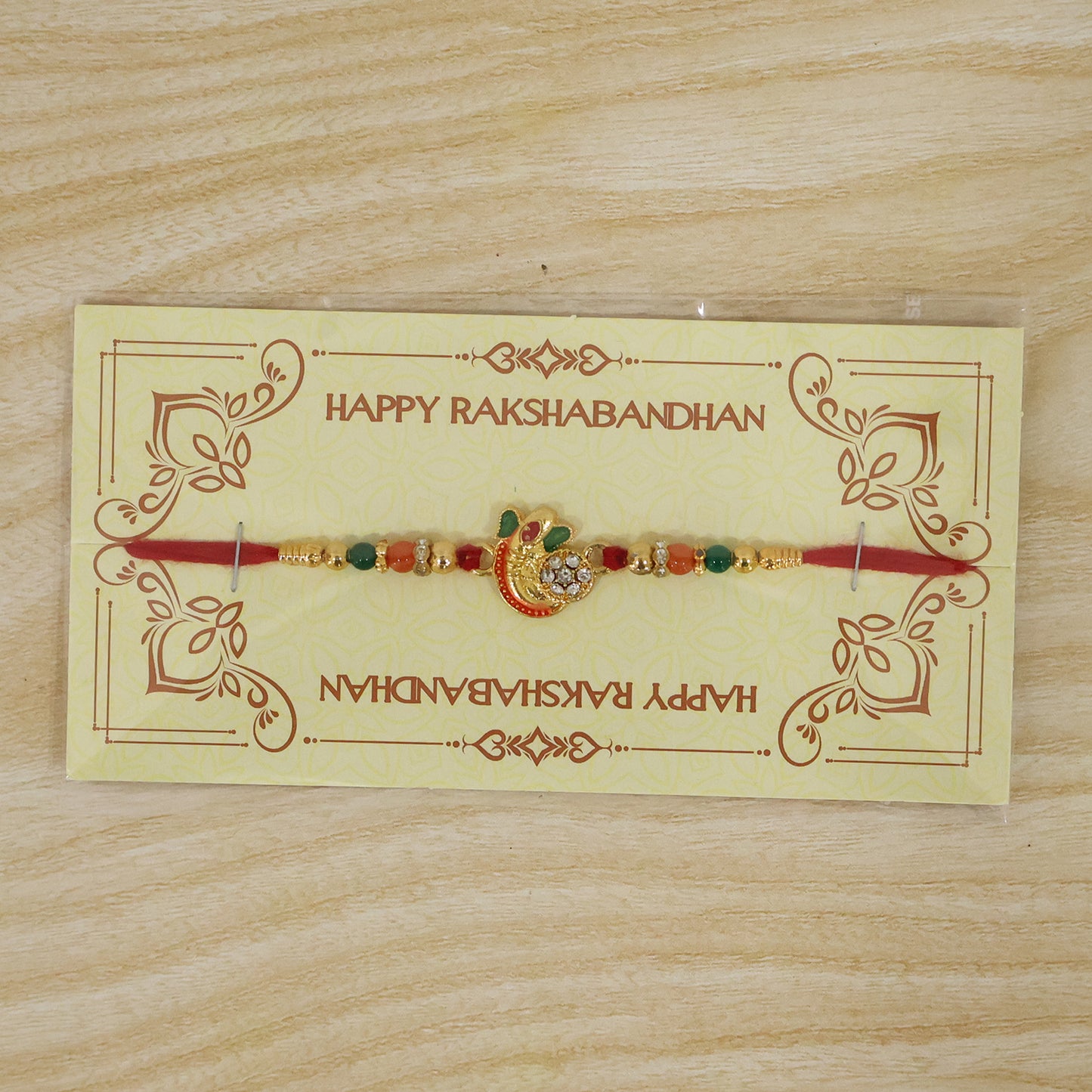 Packaging view of the Om Rakhi, ready for Raksha Bandhan gifting.