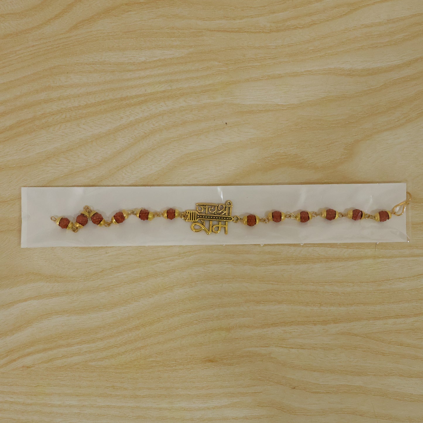 Jai Shree Ram Rudraksha Rakhi, Golden Arrow Pendant Beaded Rakhi for Brother (1 Pc)