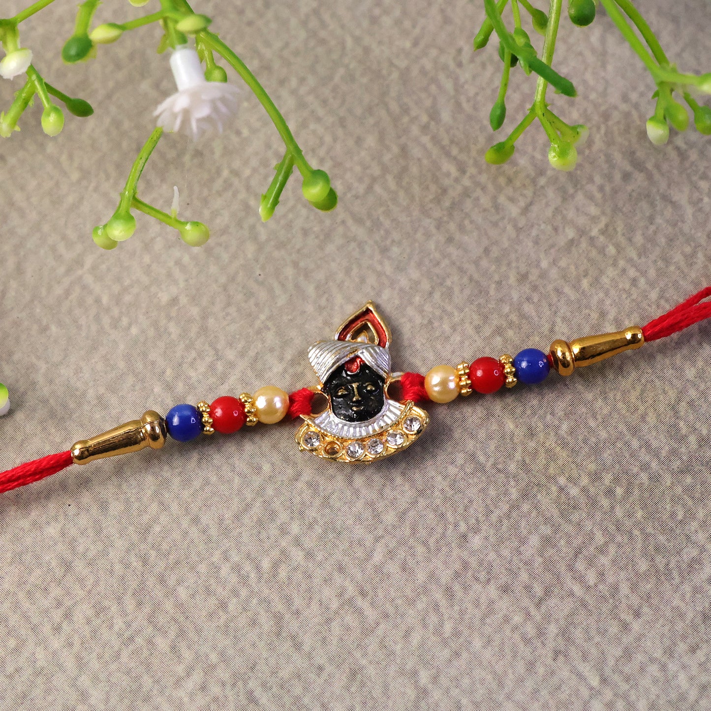 Colorful Krishna design Rakhi with detailing
