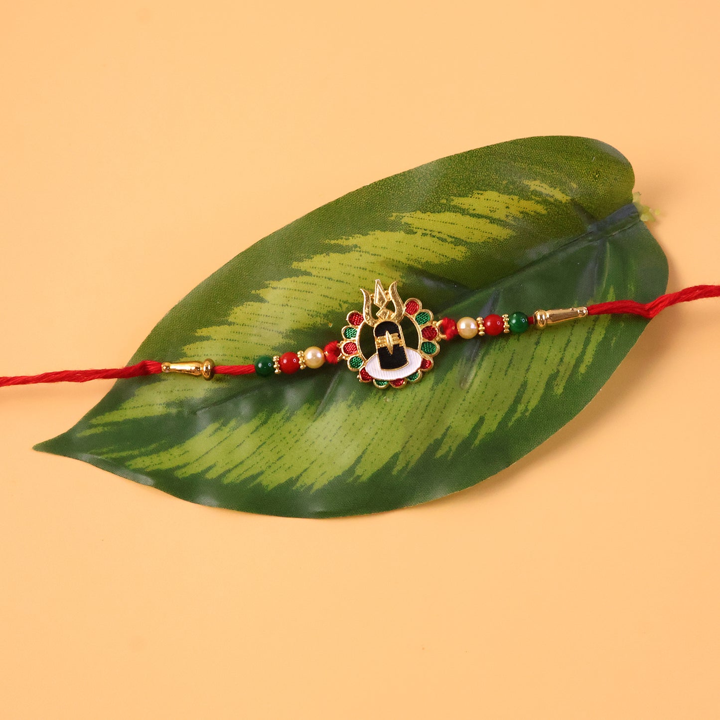 Festive Divine Shivling Rakhi close-up