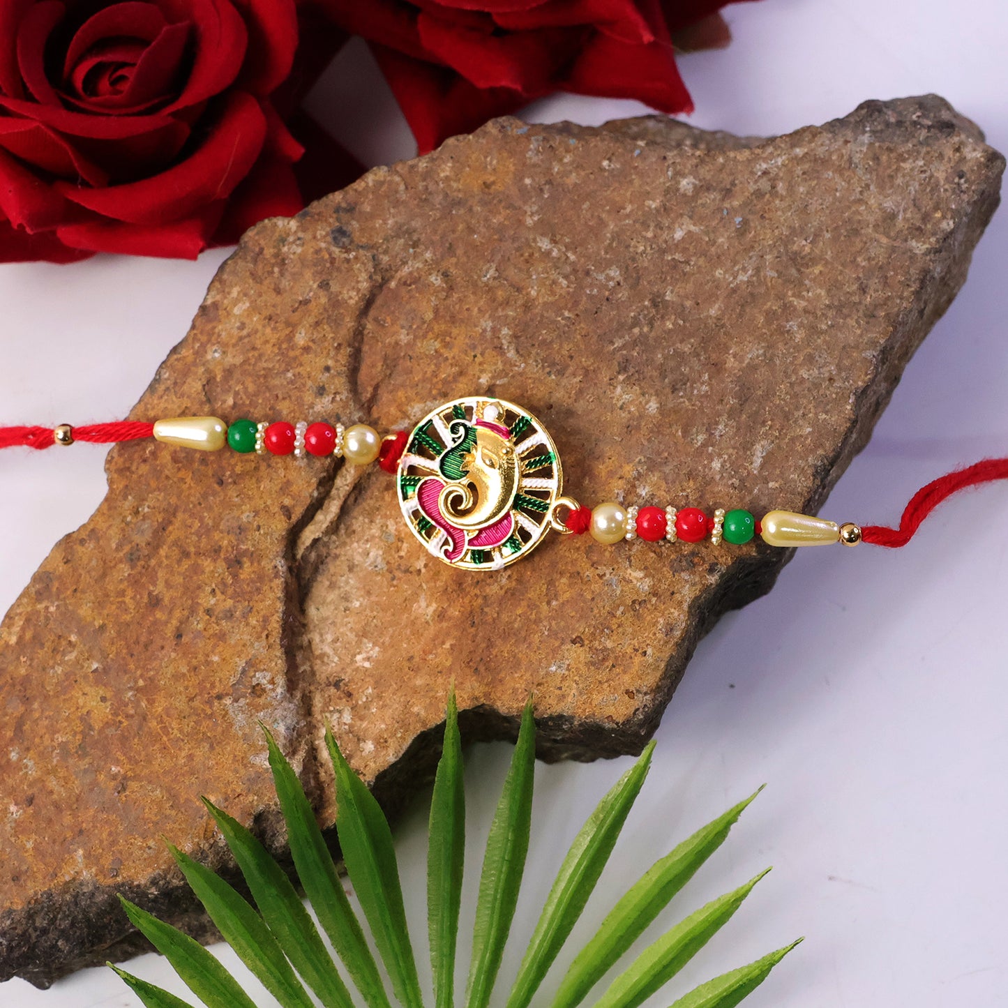Premium Ganesha Rakhi tied on wrist