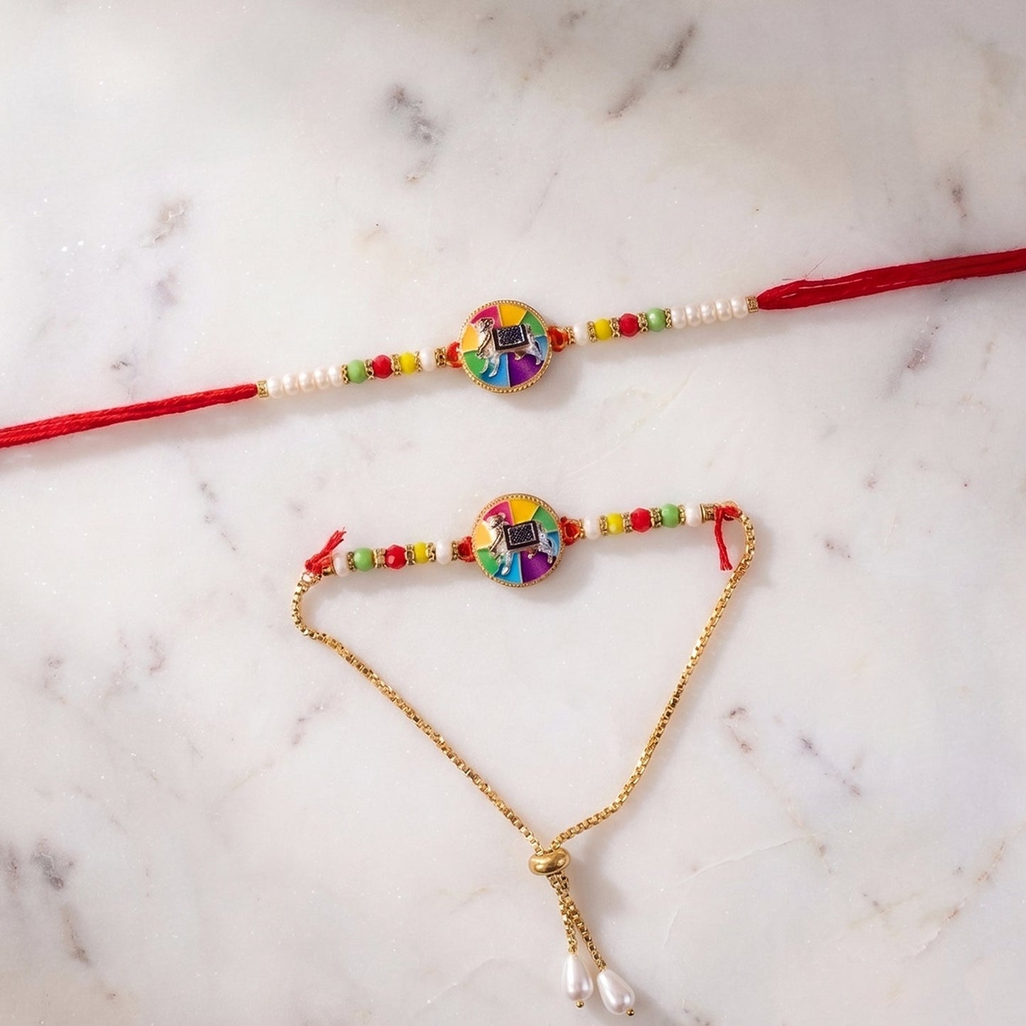 Traditional cow motif rakhi showing colorful beads and centerpiece
