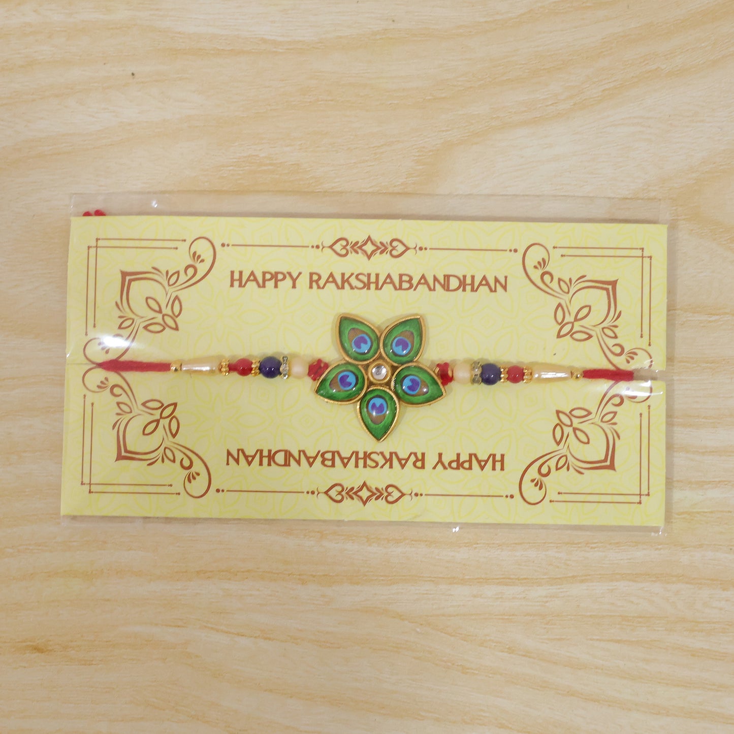 Mor Pankh Rakhi with star design displayed for Raksha Bandhan.