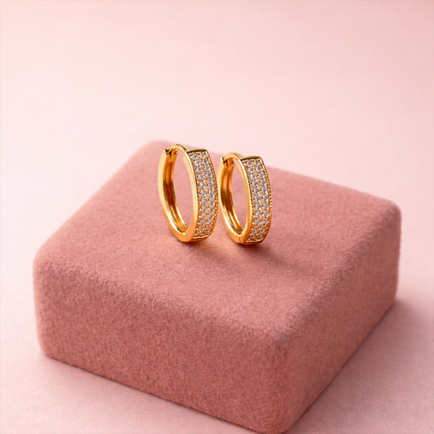 Elegant gold plated hoop earrings embedded with diamond-like cubic zirconia