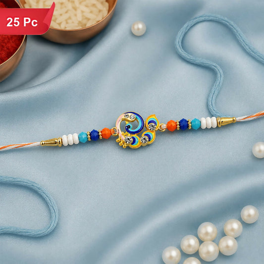 A vibrant peacock-themed Rakhi with blue, orange, and white beads, gold accents, and a blue thread, rests on a light blue