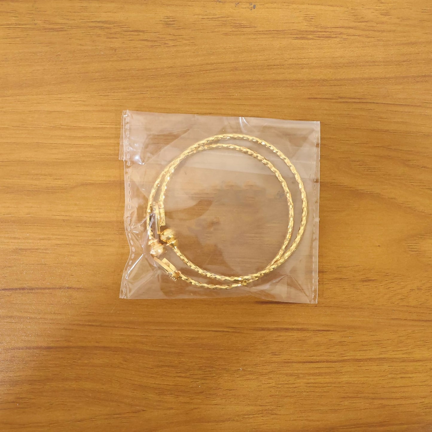 Gold plated textured black stone kada bracelet wrist shot
