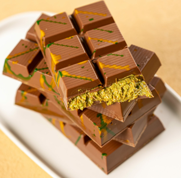 Close-up of the Dubai-style Pistachio Kunafa Chocolate Bar with visible crunchy kunafa.