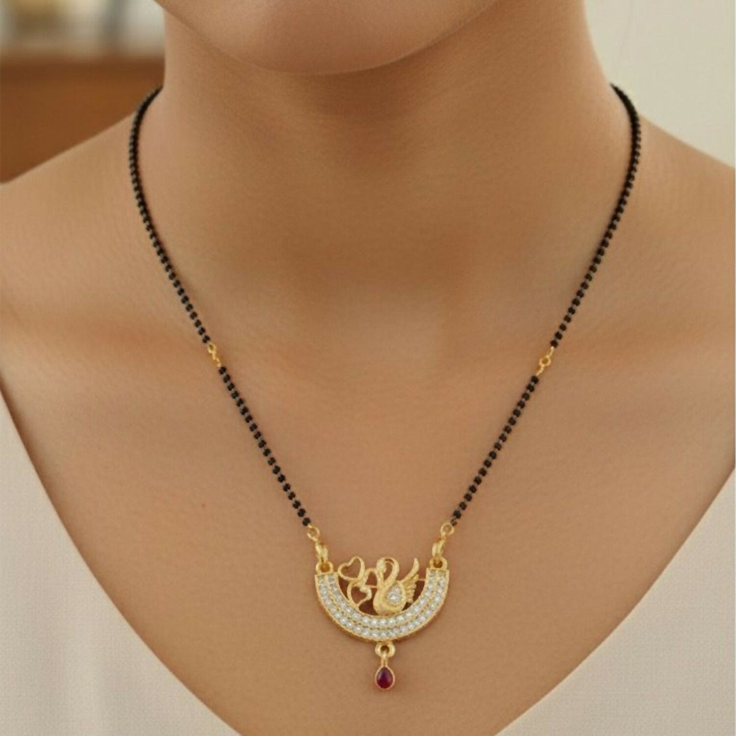 Graceful Swan Design Gold-Toned Mangalsutra with Stone-Studded Pendant