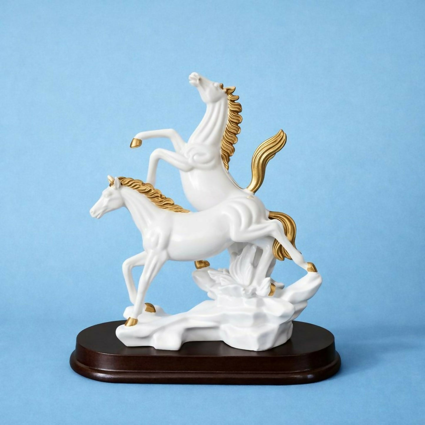 Side view of double horse decorative statue with golden accents