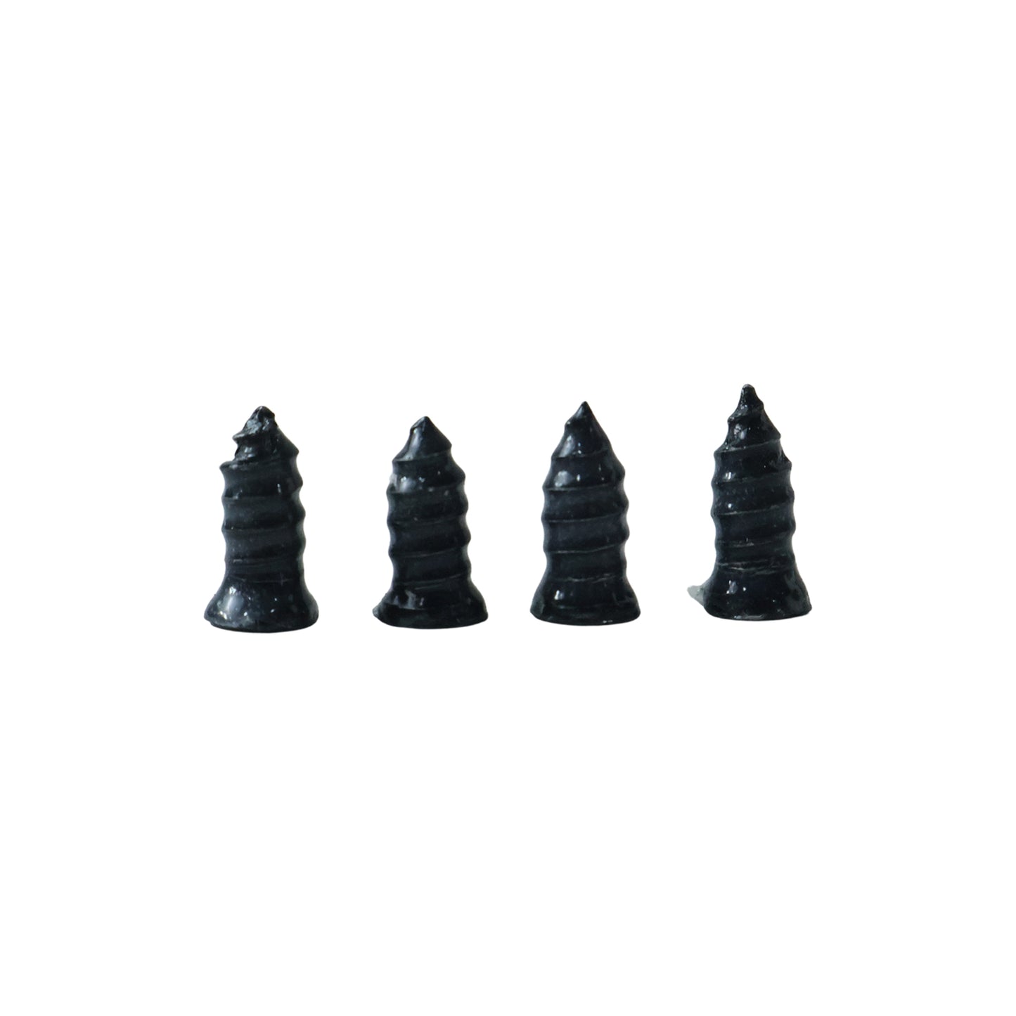 Side view of pink tire puncture repair plug