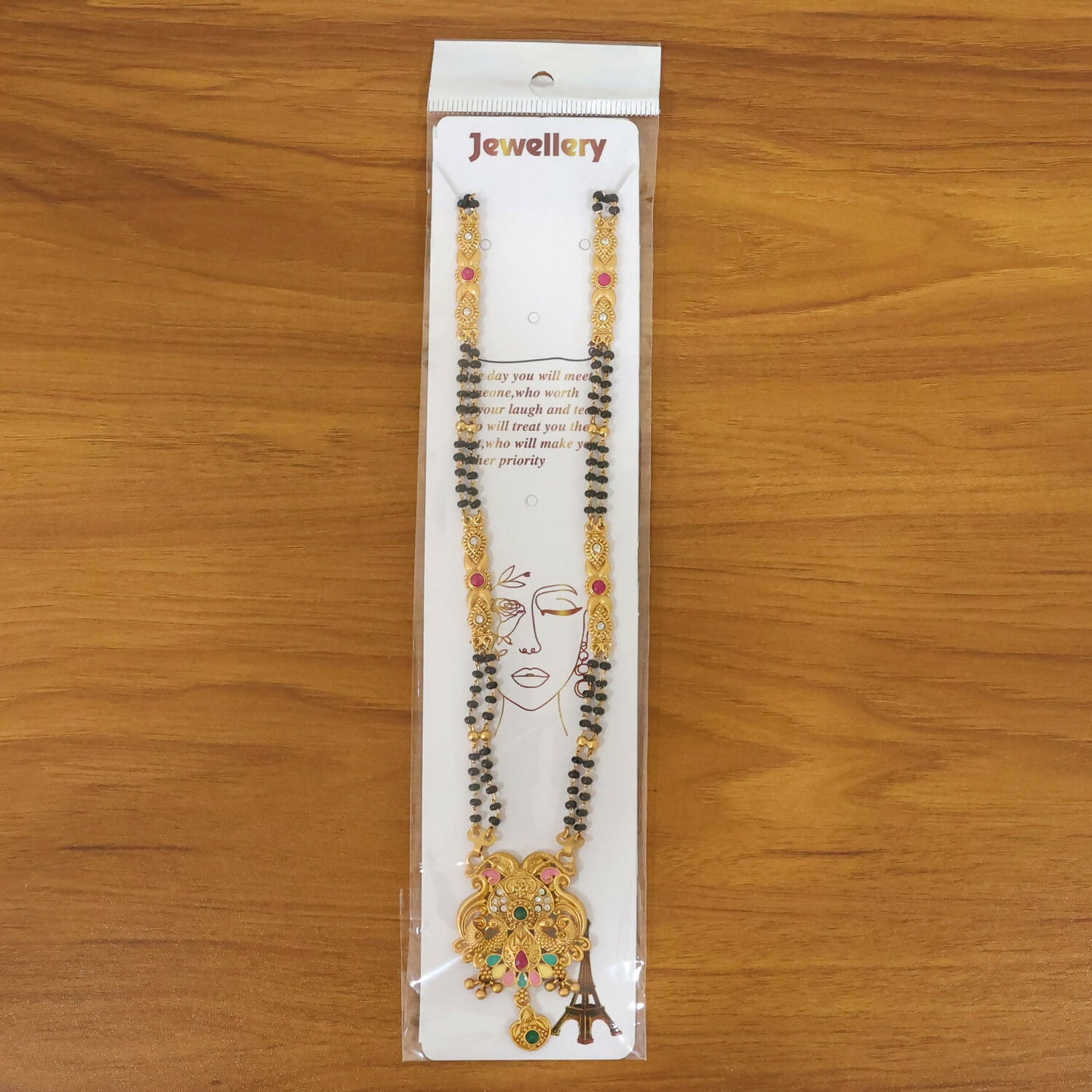Overall view of the Makara dragon scroll pendant mangalsutra worn as ceremonial jewelry
