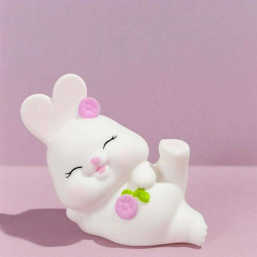 Bunny lamp placed on desk illuminating softly