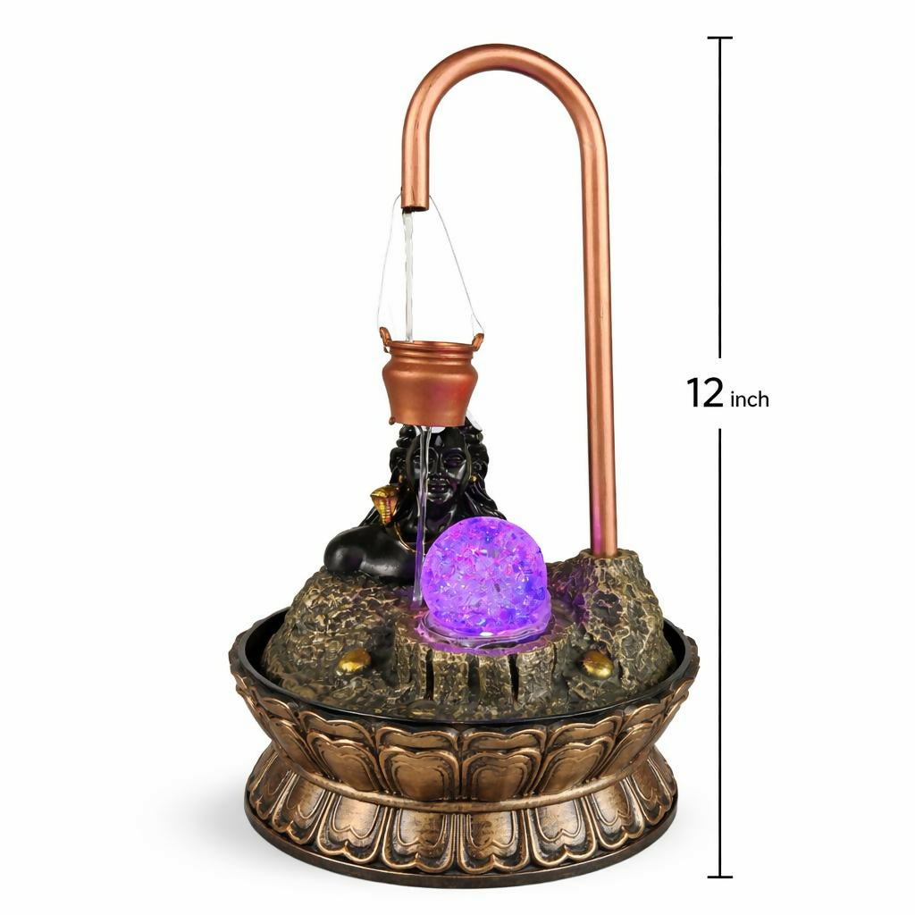 Lord Shiva water fountain placed in pooja room setting