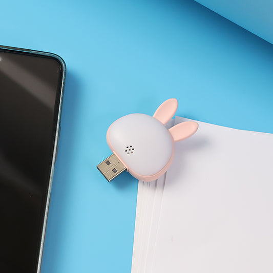 Voice-activated rabbit night light in a child's bedroom