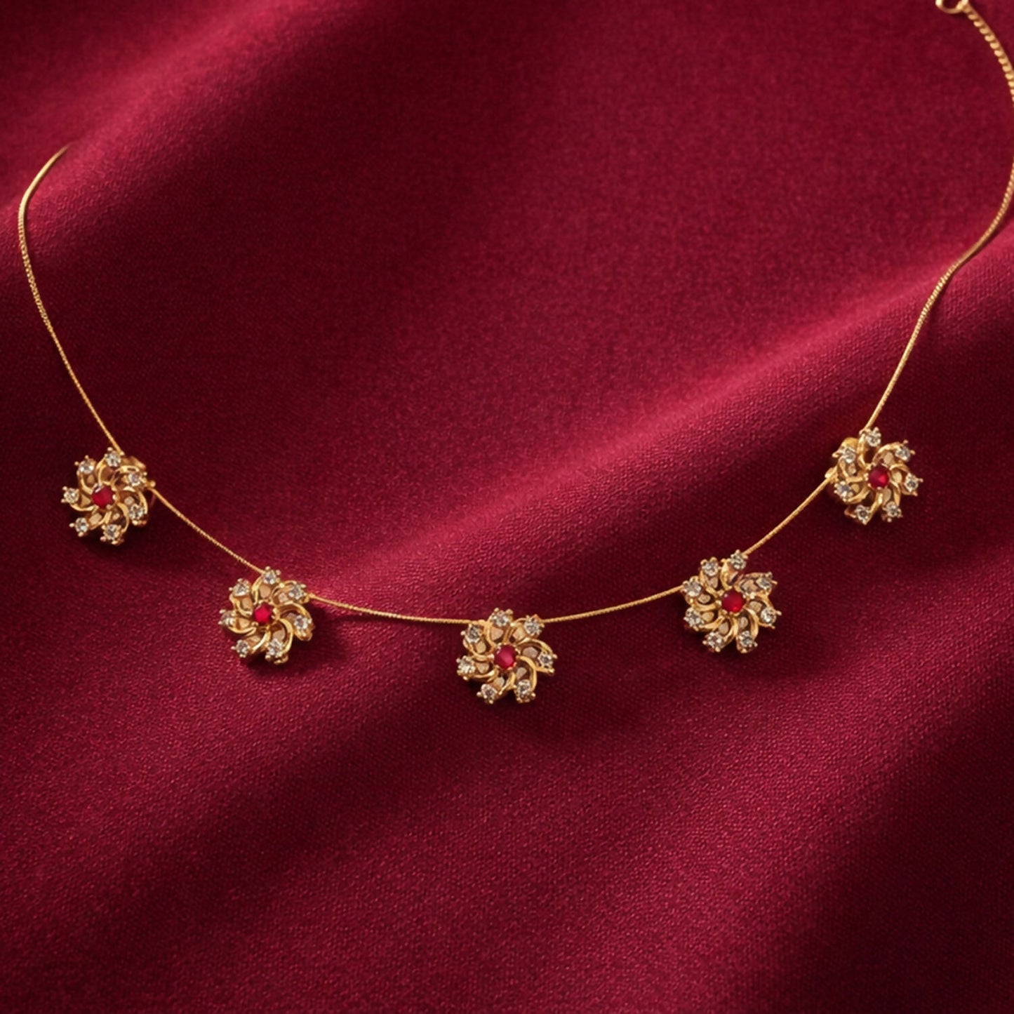 Ruby Floral Station Necklace with Diamond Detailing and Elegant Gold Chain Design