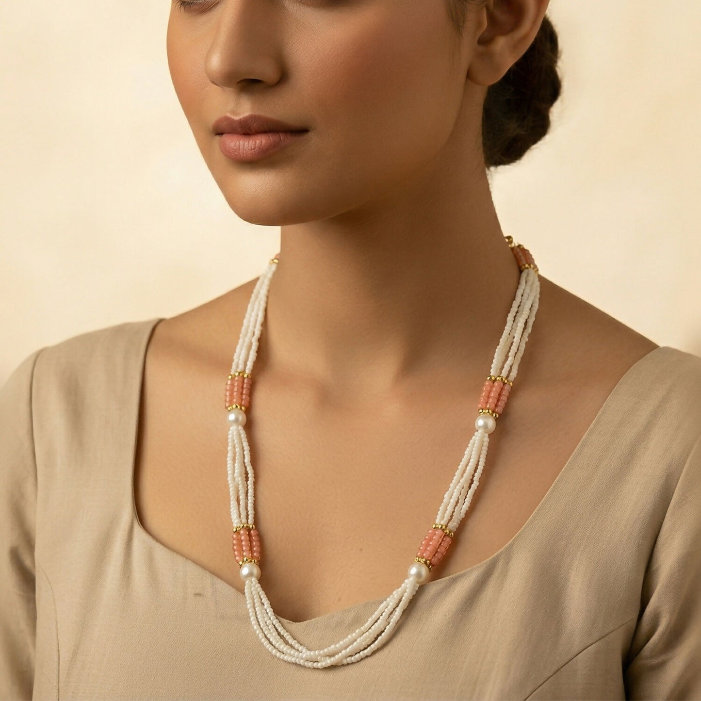 Elegant multi-layer mala necklace displayed on a white background