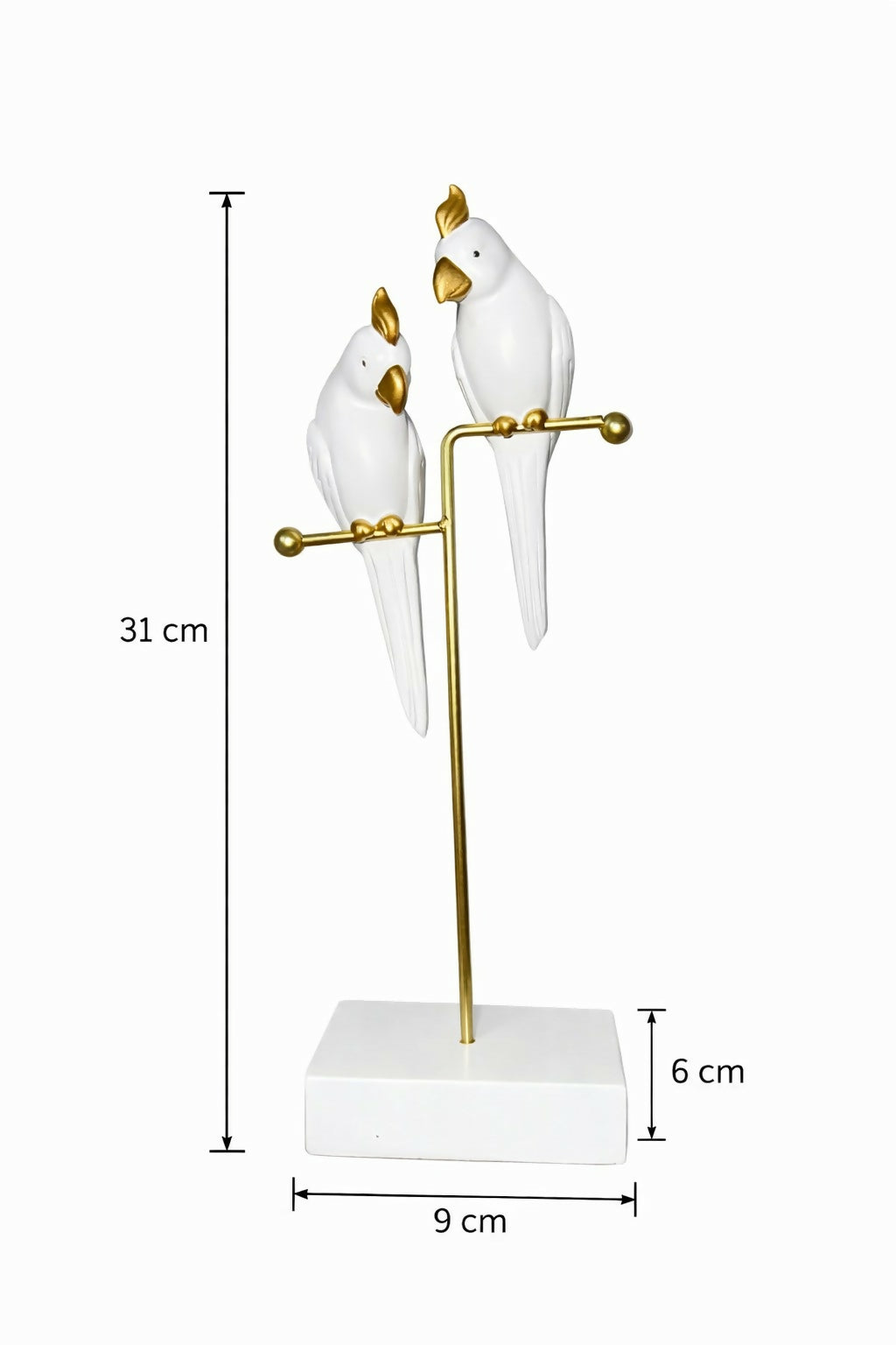 Close-up of love birds decorative resin figurine on metal stand