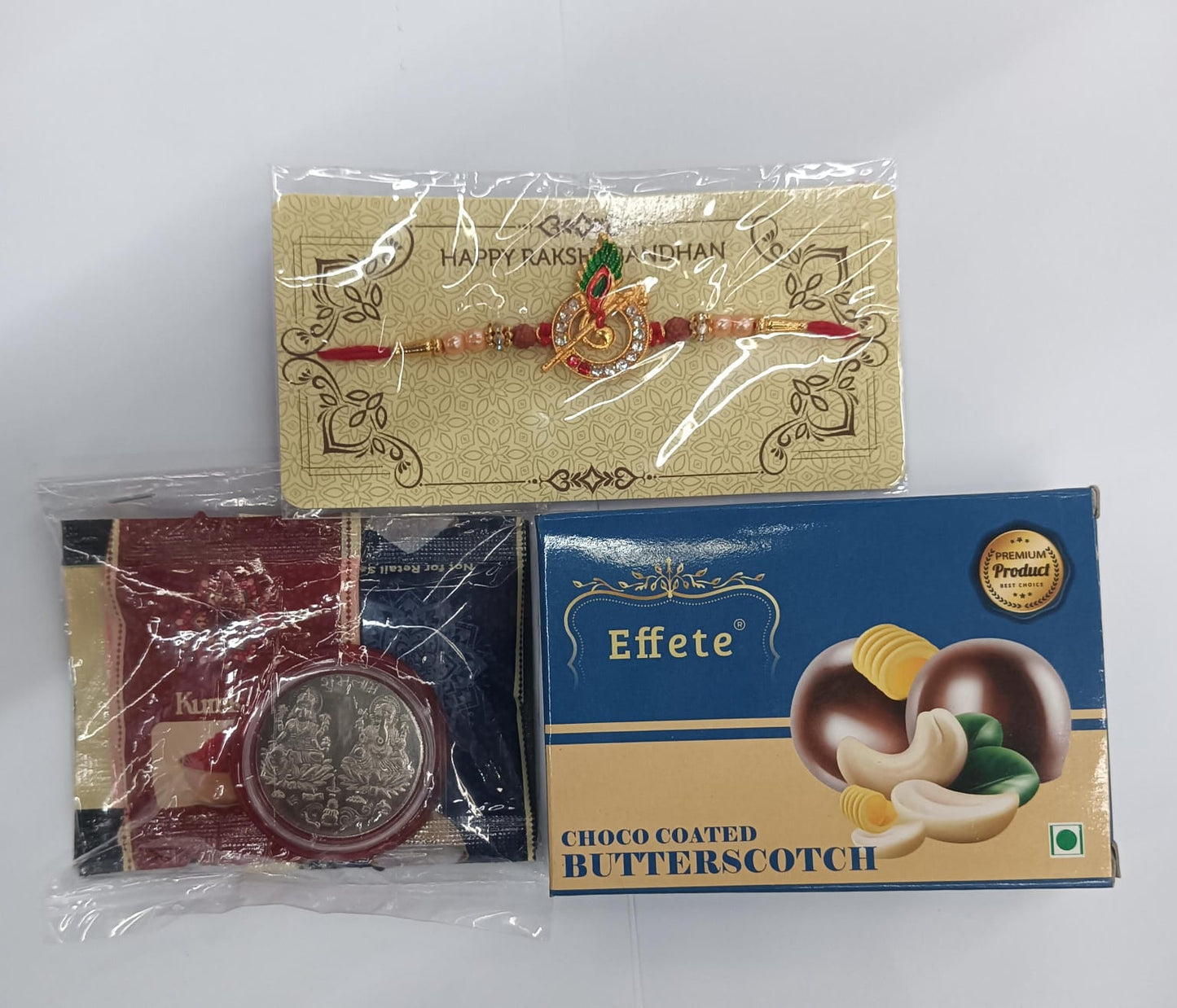 Choco coated butterscotch treats in Krishna Flute Rakhi Combo hamper