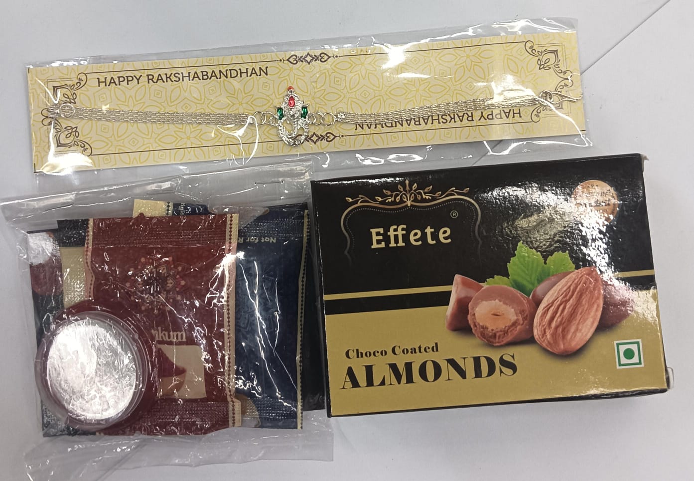 Complete Ganesh Rakhi combo set with chocolates and traditional roli-chawal items for Raksha Bandhan