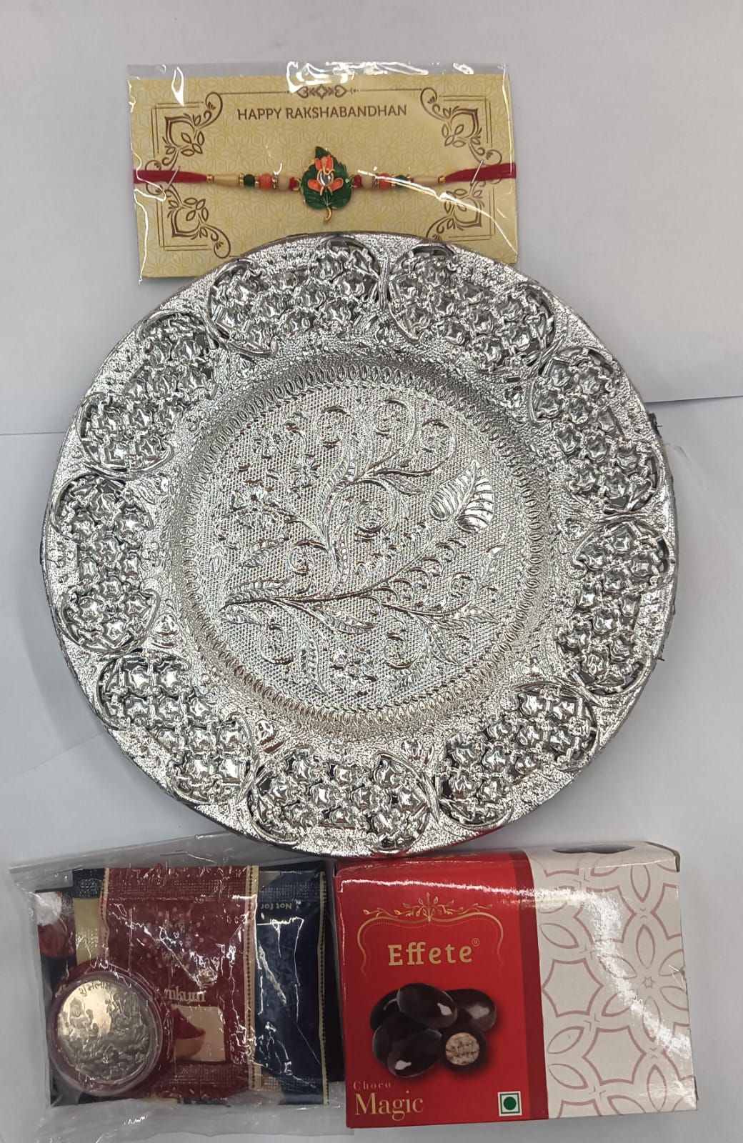 Ganesh Rakhi and chocolate sweet treat in the festive combo gift set
