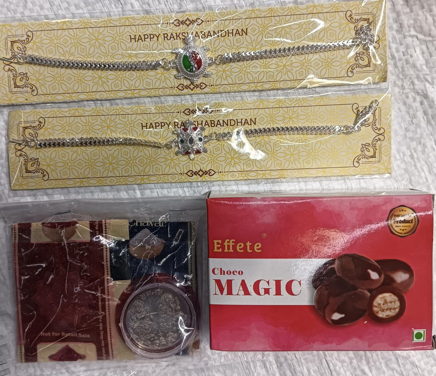 Rakhi Gift Combo with 2 Designer Rakhis for Brother โ Includes Choco Magic Box, Silver Coin, Roli Chawal & Greeting Card,Rakhi Gift Combo