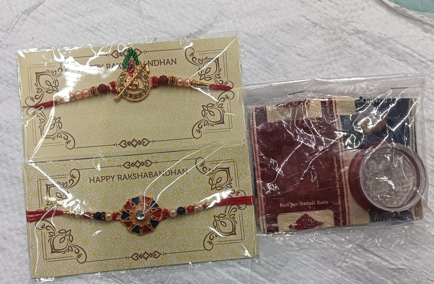 Rakhi Gift Combo with 2 Premium Rakhis for Brother – Includes Choco Coated Almonds Box, Silver Coin, Roli Chawal & Greeting Card