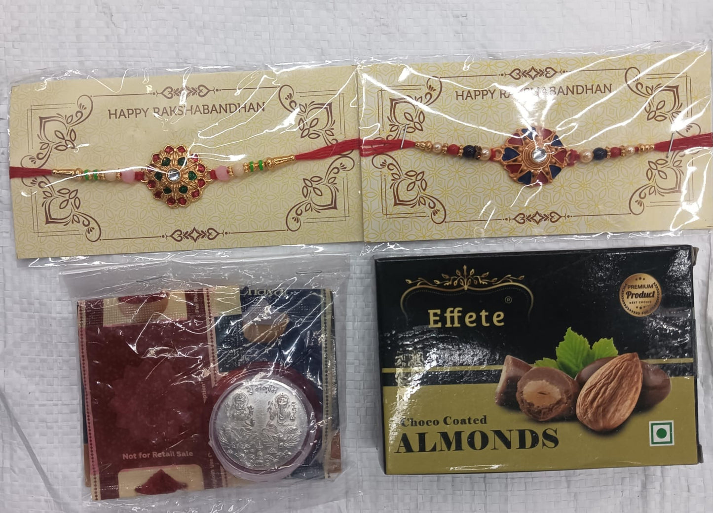 Premium Rakhi Gift Set for Brother – 2 Traditional Rakhis with Choco Almonds, Silver Coin, Roli Chawal & Festive Greeting Card,Rakhi Gift Combo