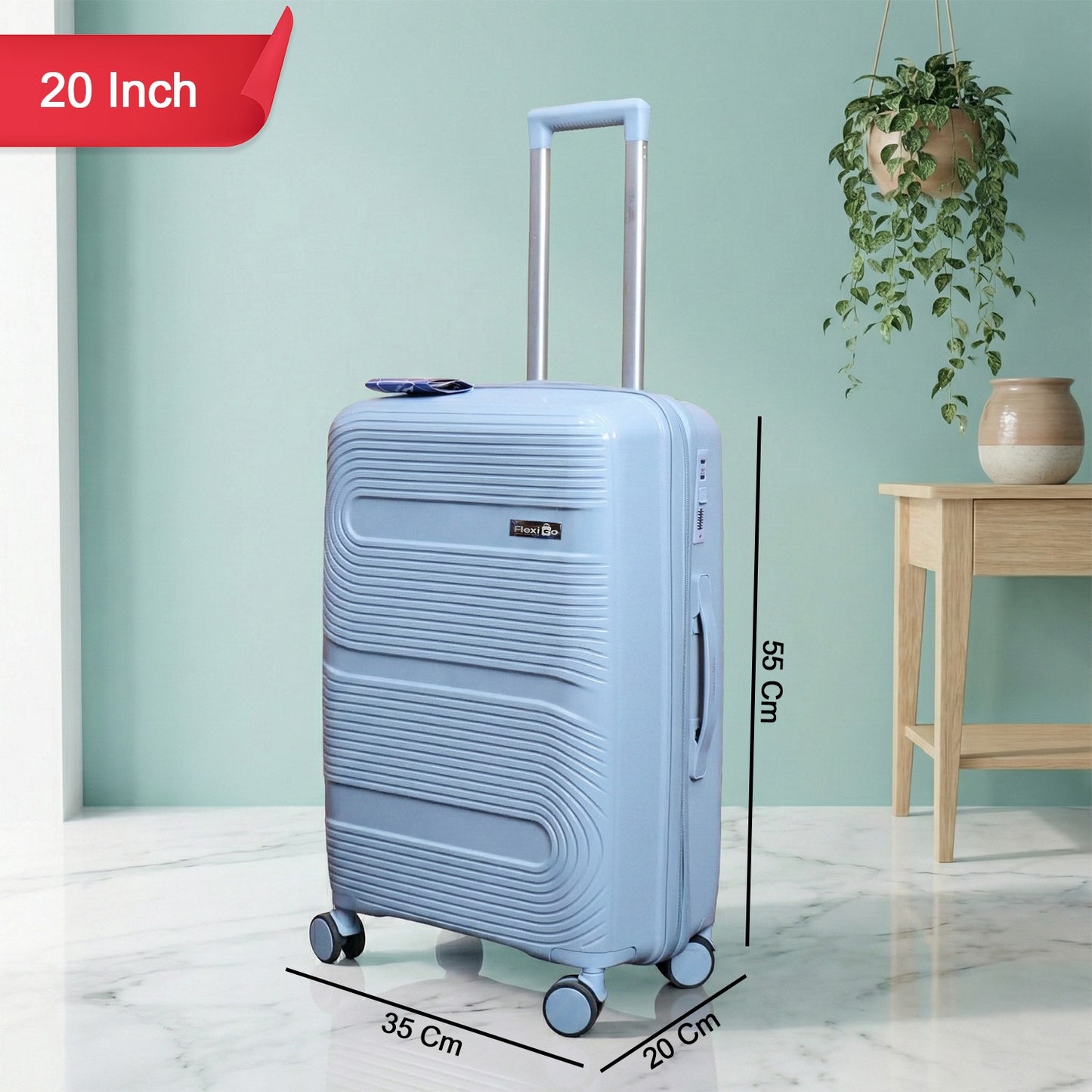 Grey blue hard shell cabin trolley suitcase standing upright with telescopic handle extended