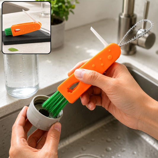 A person cleans a bottle cap with an orange 3-in-1 brush, featuring green bristles and a white crevice tool.