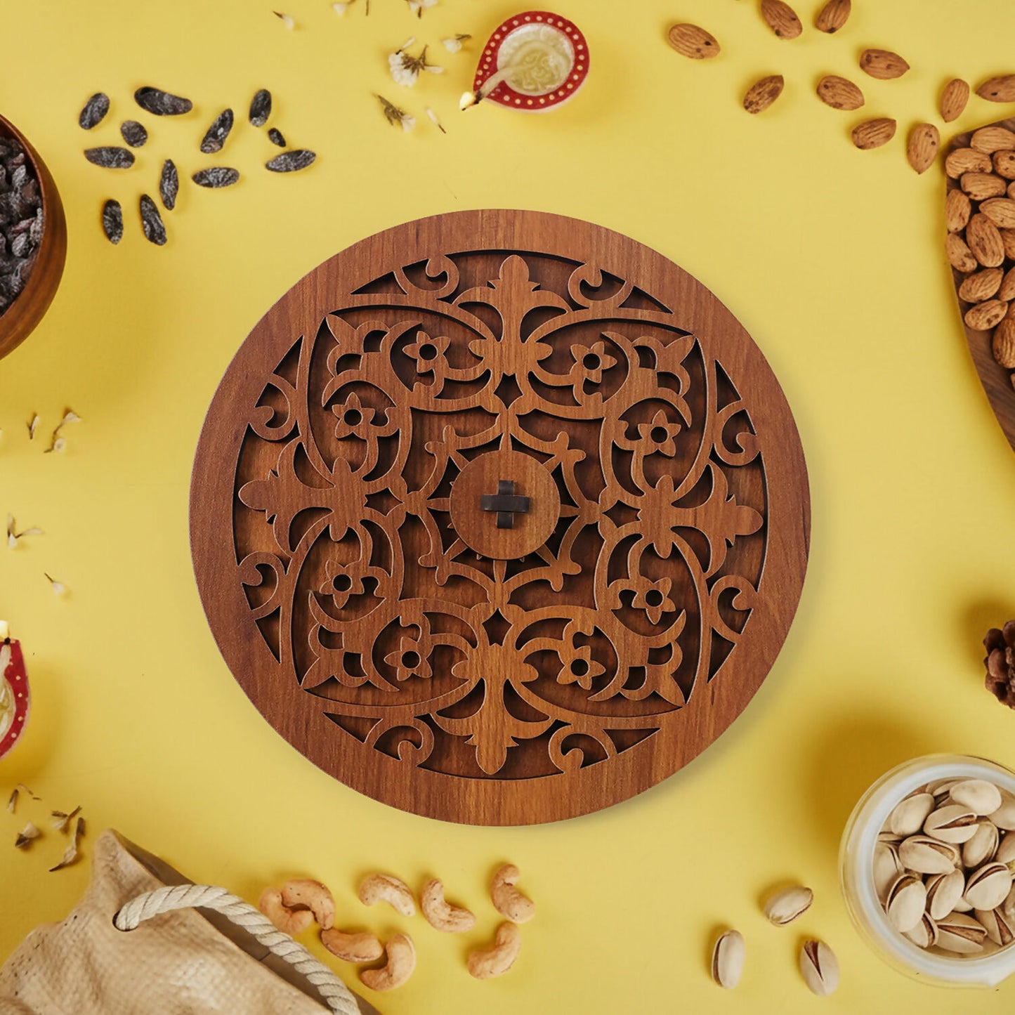 Close-up of carved wooden lid of dry fruit storage box highlighting detailed craftsmanship