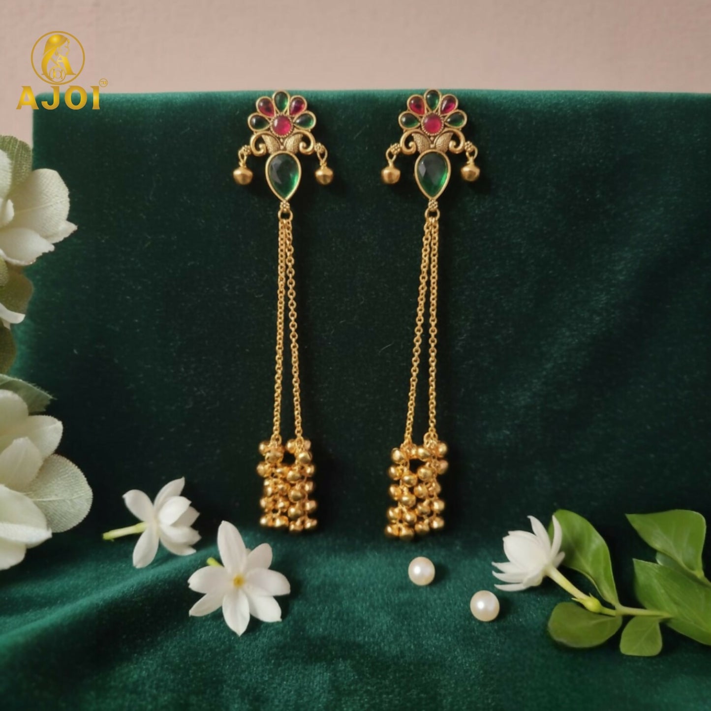 Side view of Kashmiri gold plated latkan earrings highlighting intricate design