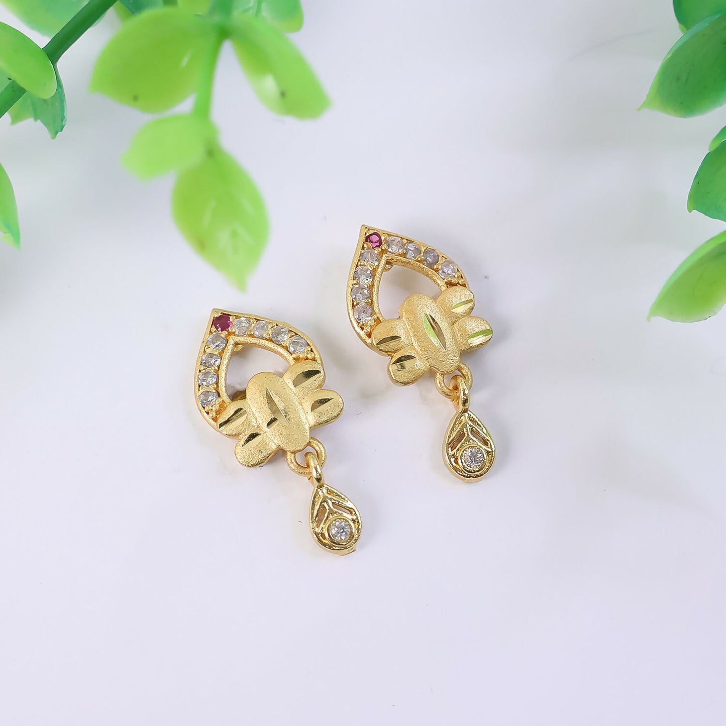 Modern Floral Gold Finish Stud Earrings With Polished Texture And Drop Accent