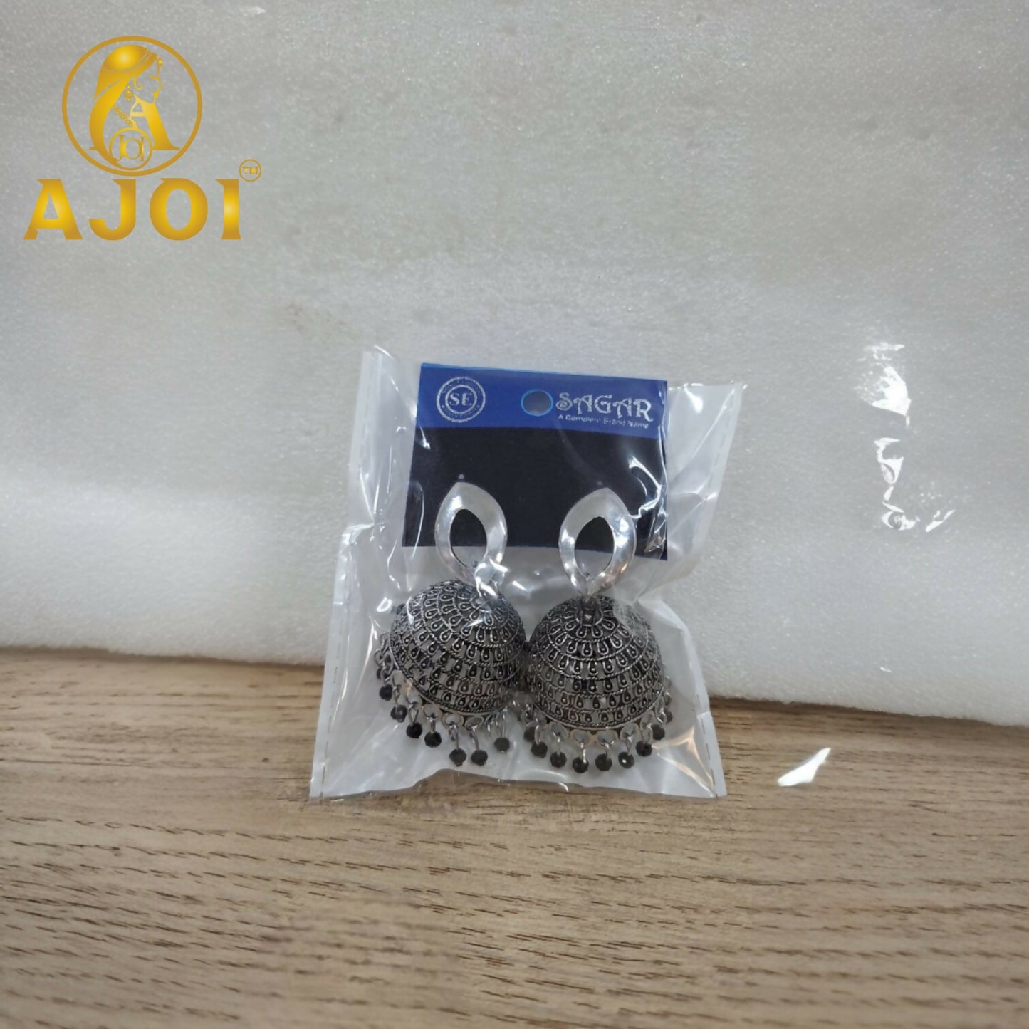 Designer Silver Teardrop Jhumka Earrings with Elegant Traditional Detailing