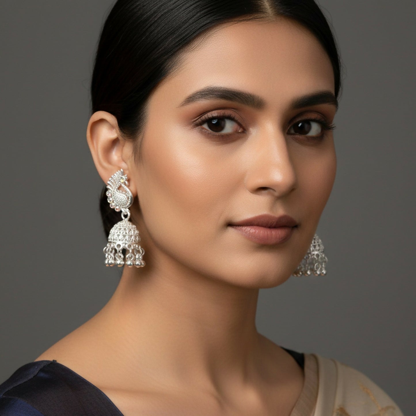 Elegant Silver Finish Peacock Jhumka Earrings
