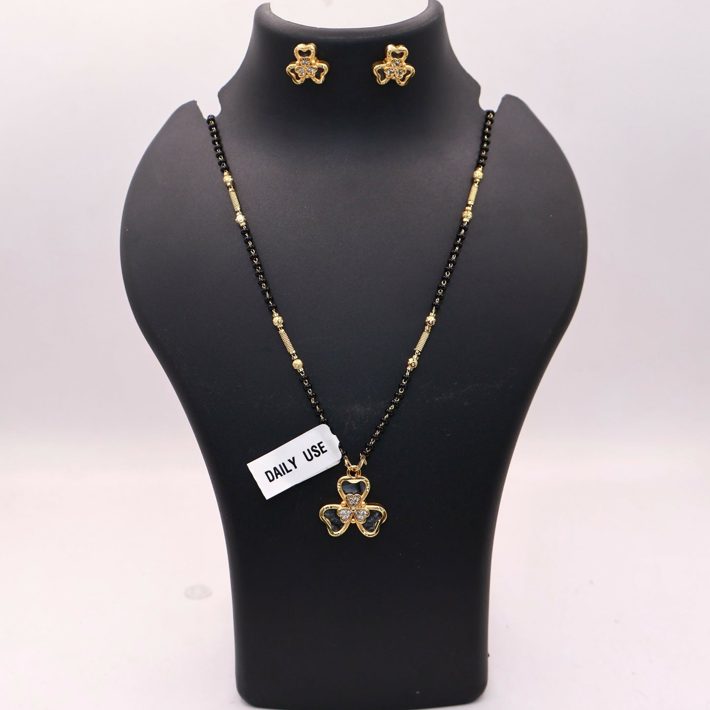 Gold-Plated AD Floral Mangalsutra Set with Clover Stud Earrings for women