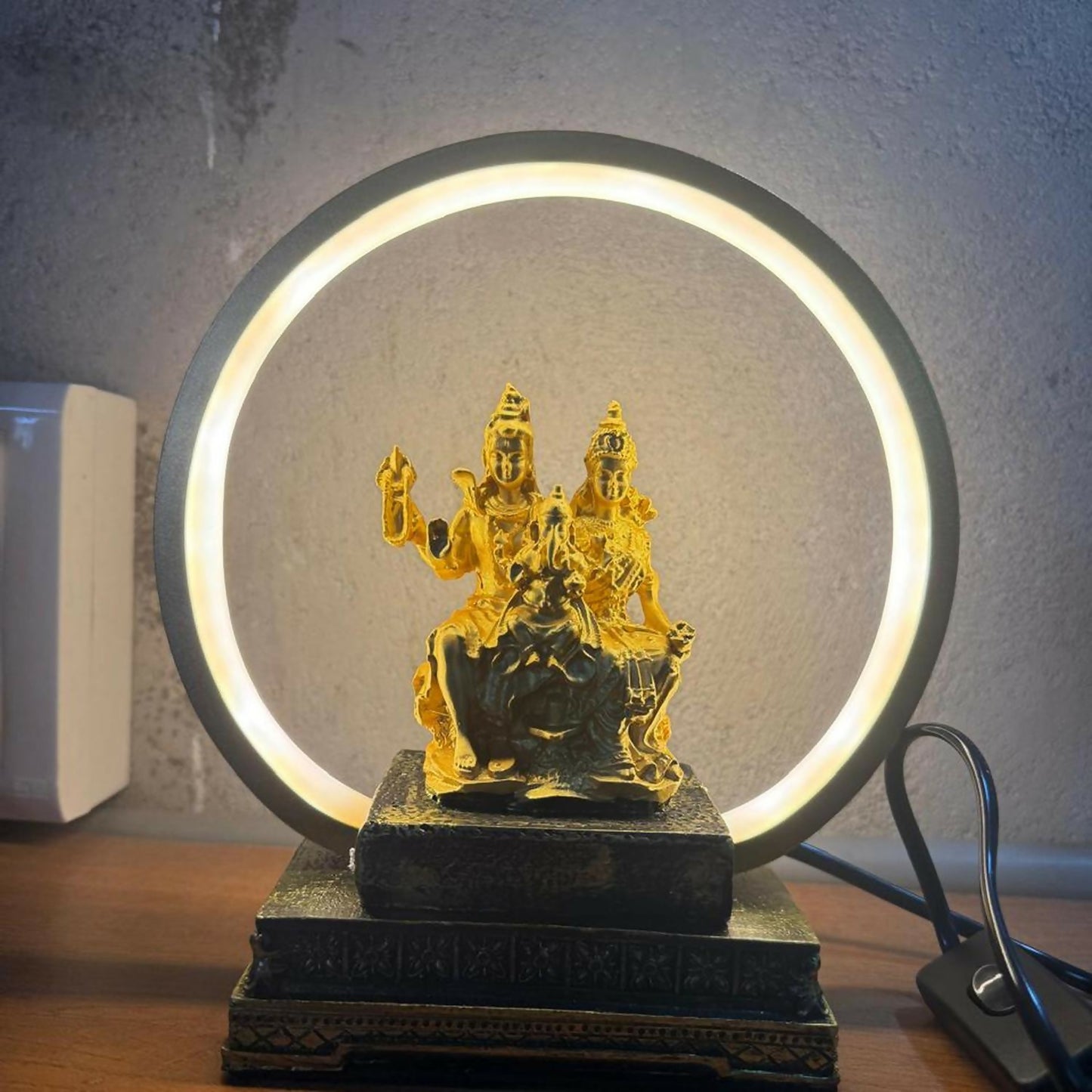 Golden Shiv Parvati Ganesh LED Table Lamp with Decorative Ring Light | Spiritual Home Decor Night Lamp | Antique Finish Religious Gift for Puja Room, Living Room, Bedroom & Office | Divine God Idol with LED Circle Light
