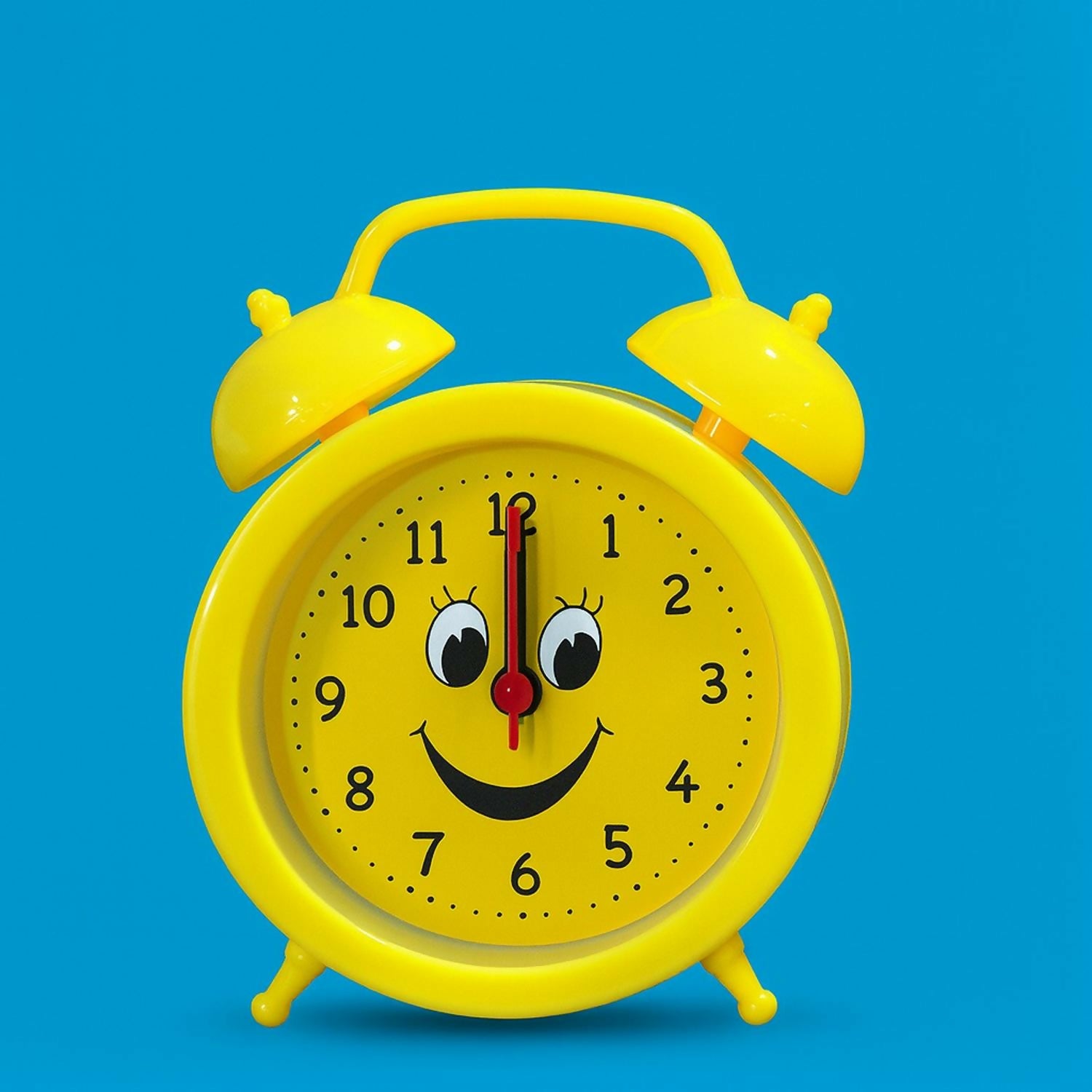 Yellow Smiley Face Twin Bell Alarm Clock for Kids | Cute Cartoon Expression Table Clock | Loud Alarm, Easy-to-Read Numbers, Battery Operated Decorative Desk & Bedside Clock for Home, Study, Bedroom & Gifts