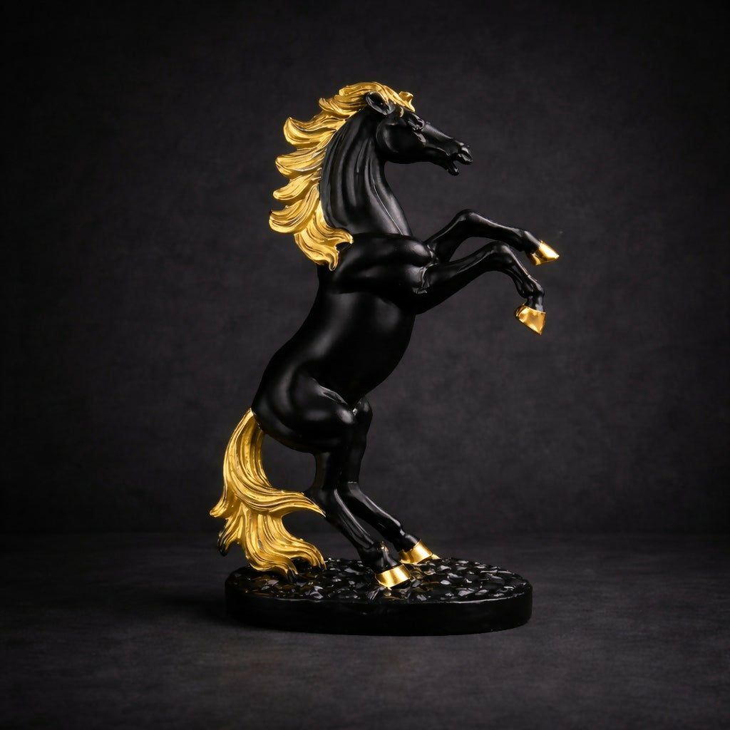 Elegant black and gold horse statue on table
