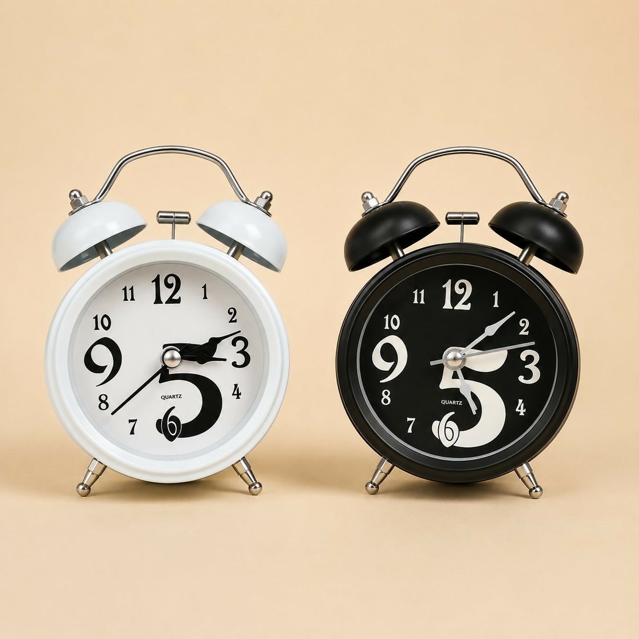 Front view of compact twin bell alarm clock with bold numbers