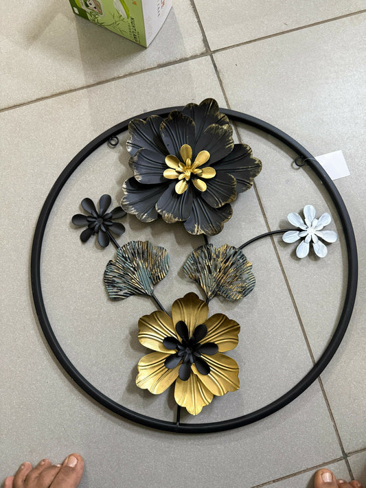 Detailed metal floral wall art decor showing texture and colors