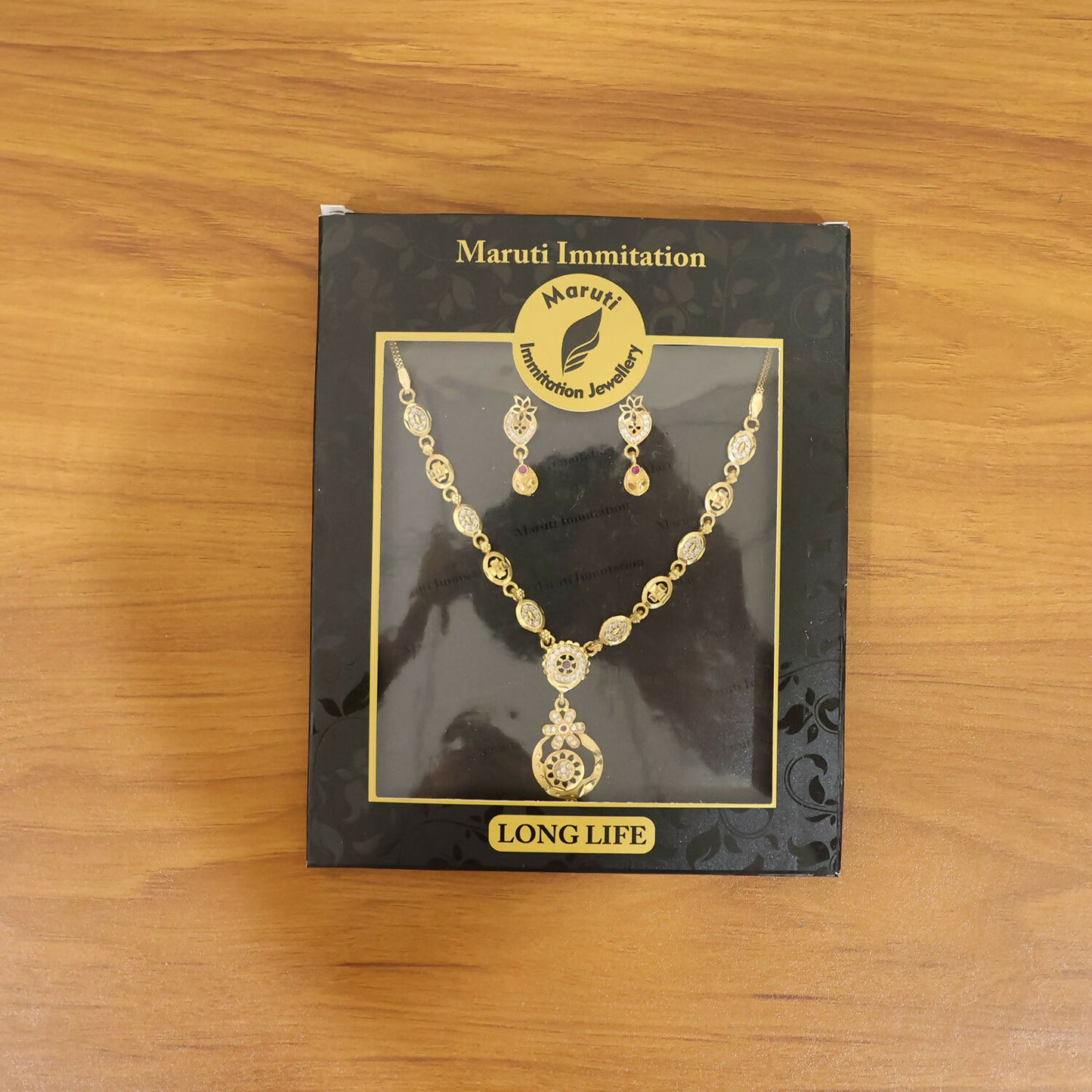 Stylish Gold-Tone Circular Pendant Necklace Set with Floral Accent & Matching Earrings