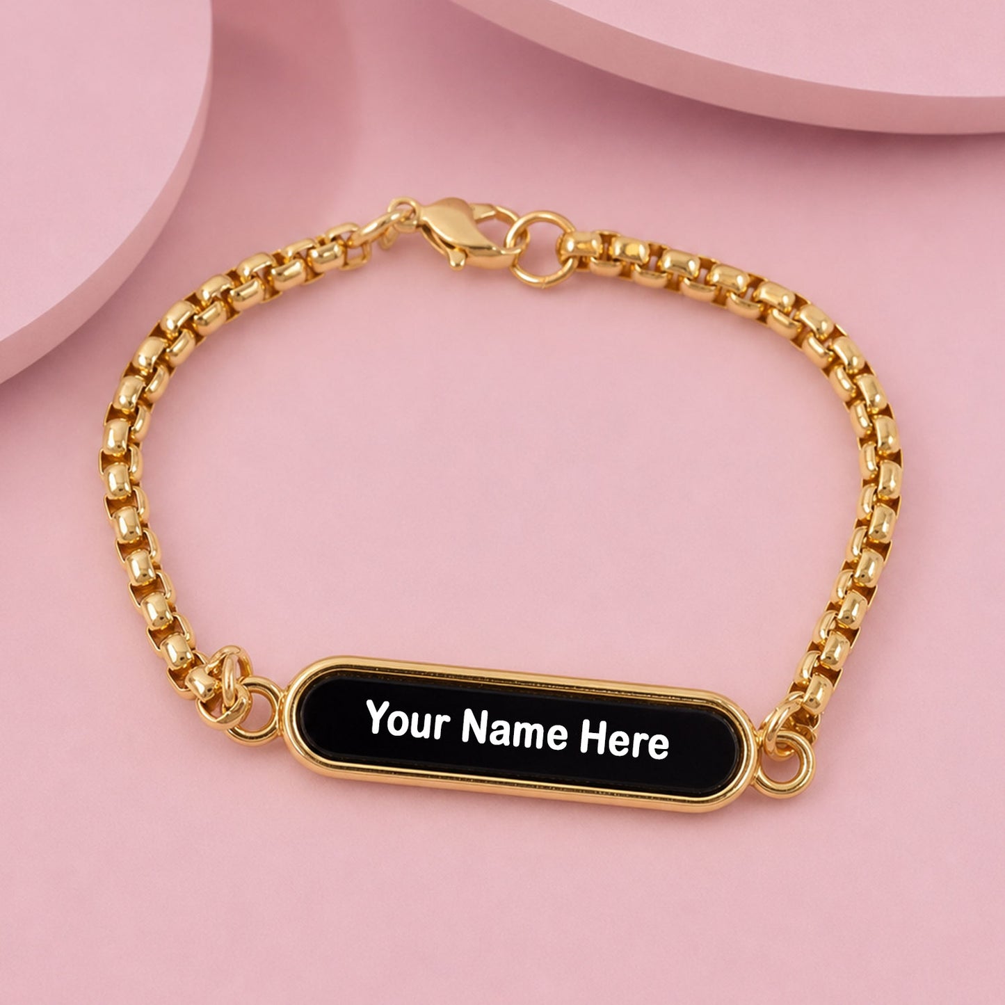 Personalized Name Bracelet with black enamel nameplate and dual-tone chain.