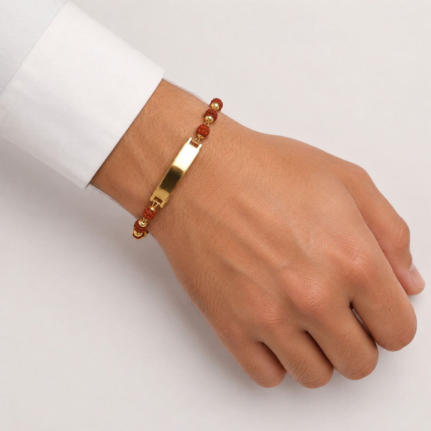 Side view of the personalised gold plated name bracelet showcasing its durable design.