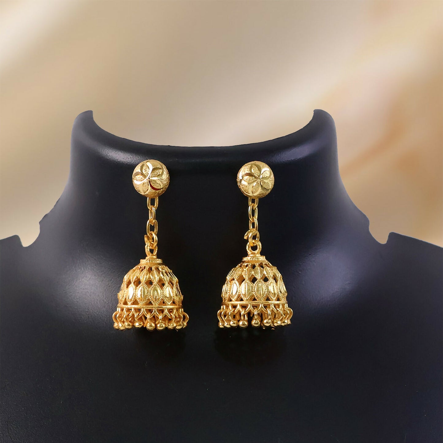 Traditional Gold-Finish Jhumka with Intricate Cutwork Design